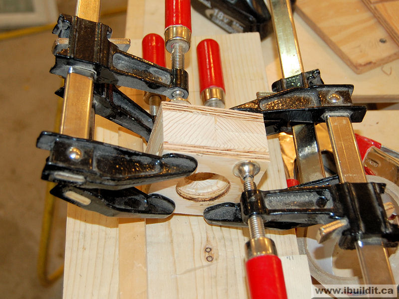 clamps on wooden nut